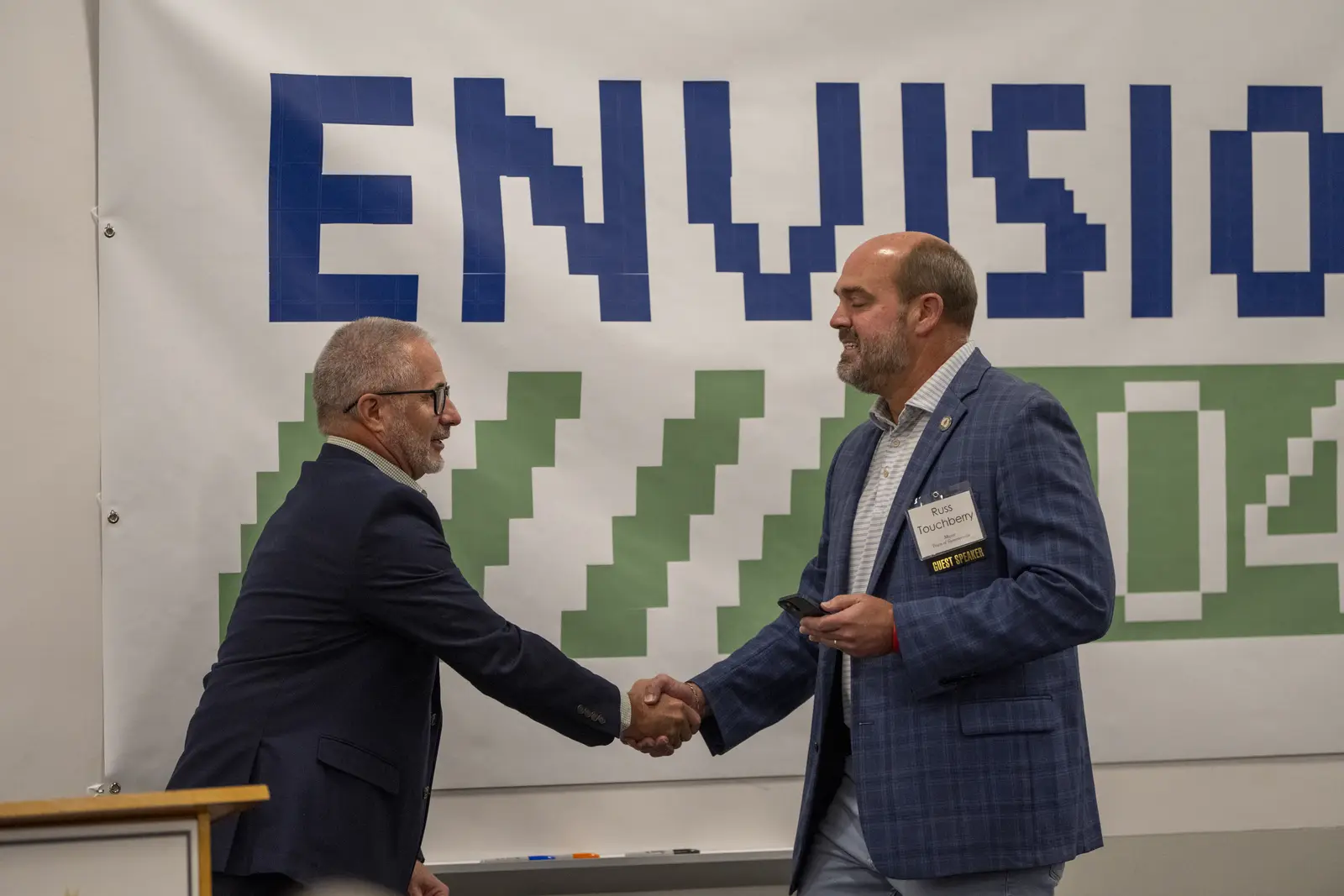Partners connecting at an Envision 2047 event