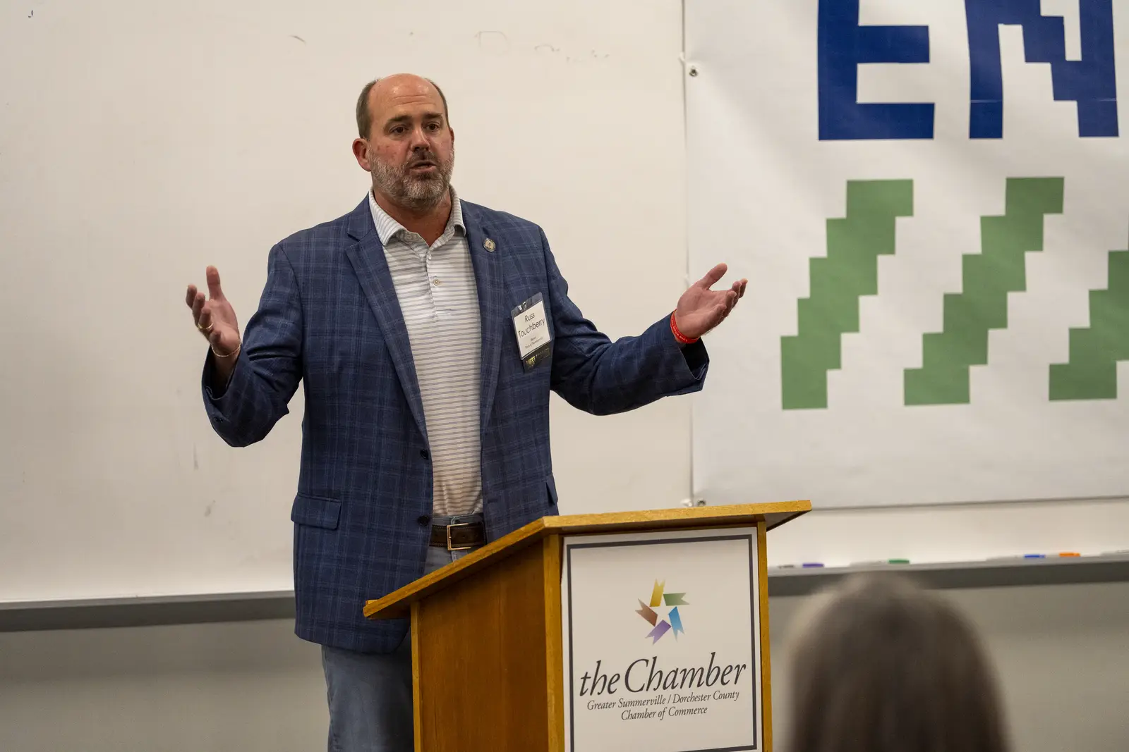 Speaker addressing the community at a Foundation event