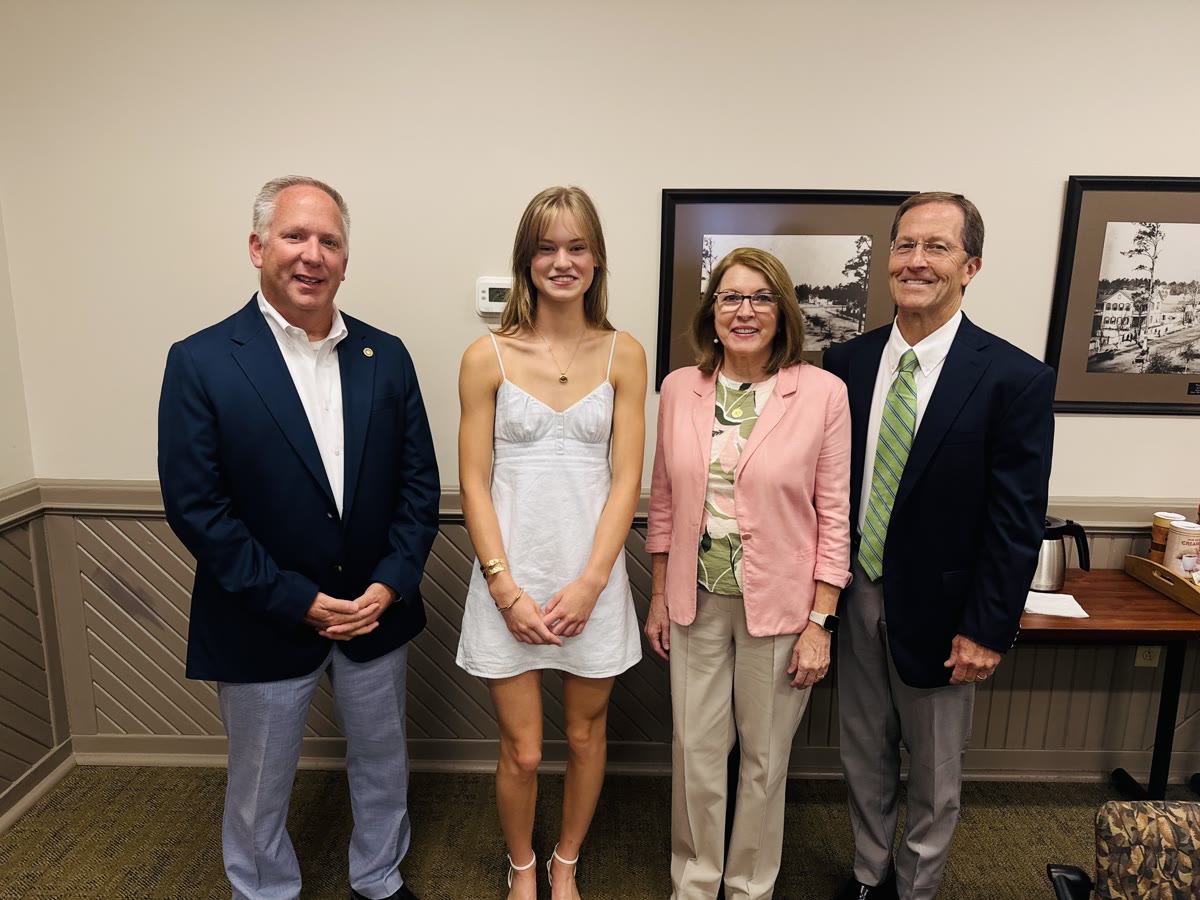 A student recognized at a Chamber Foundation event